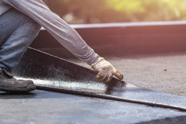 Professional Basement Waterproofing technician working in Falmouth, KY